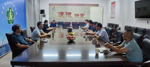 图为市残联召开庆“八一”退役军人座谈会