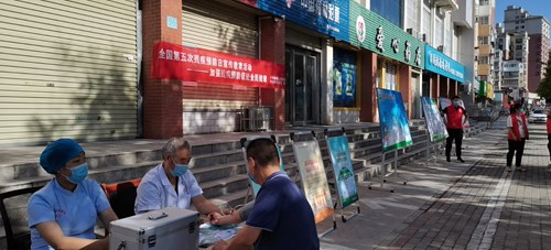 图为市残联开展第五次全国“残疾预防日”活动现场