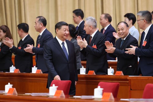 图为9月18日，中国残疾人联合会第八次全国代表大会在北京人民大会堂开幕。这是中共中央总书记、国家主席、中央军委主席习近平步入会场。新华社记者 庞兴雷 摄
